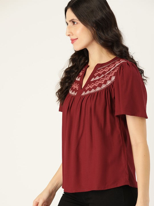 Maroon Solid Regular Top With Embroidered Detail
